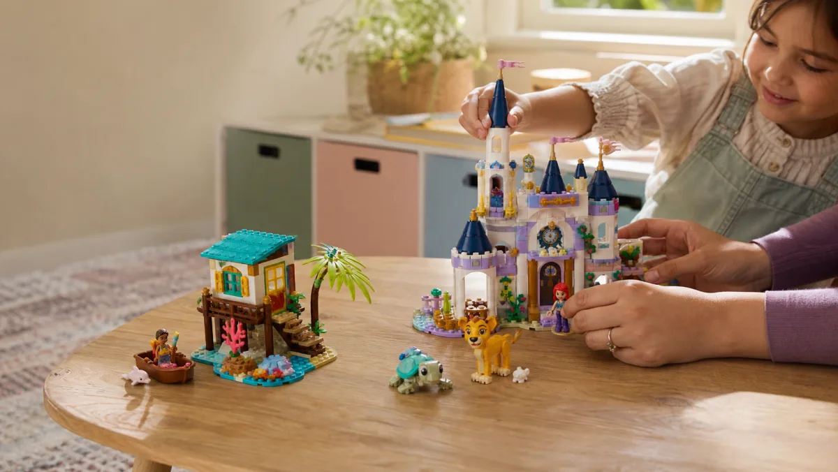 Real LEGO Disney product images on a photorealistic bright play table