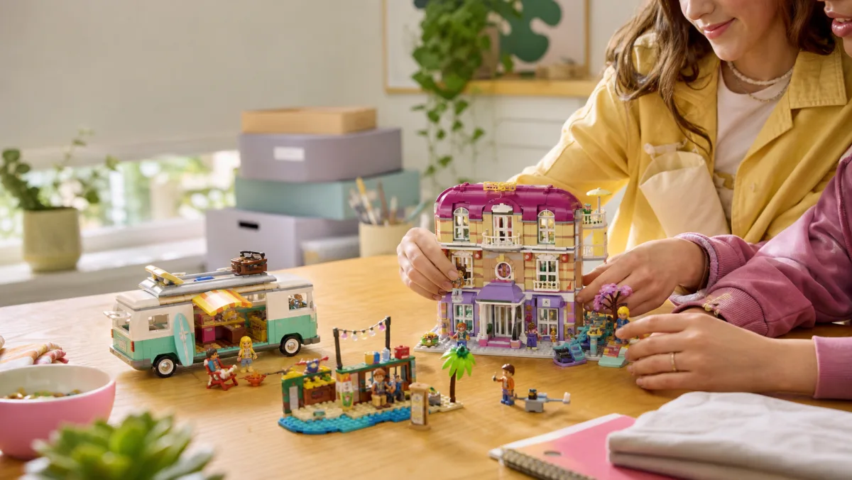 Real LEGO Friends product images on a photorealistic bright play table